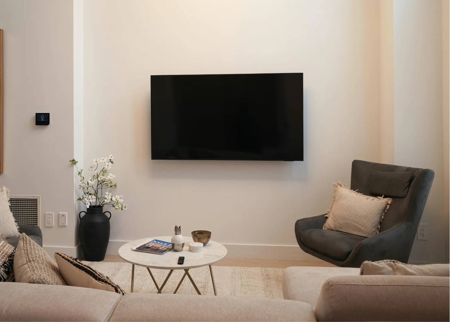 Finished wall-mounted TV installation in a living room